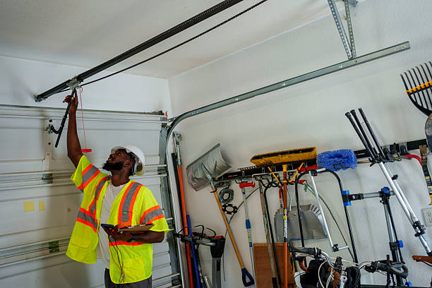 Professional Garage Door Panel Replacement technician working in Lewiston, ME